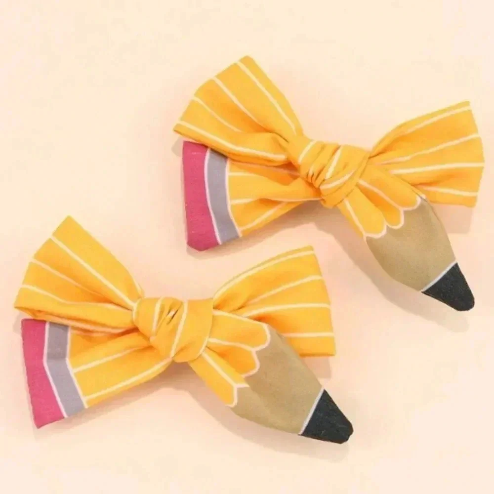 Yellow pink and white pencil ribbon bow barrettes back to school ponytail holder
